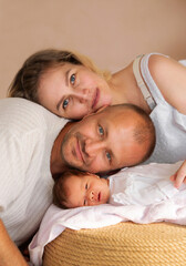 Family portrait of newborns' first moments with parents. High quality photo