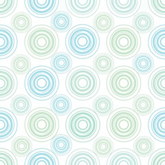 Seamless pattern of concentric circles in blue and green.