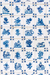Typical Portuguese old blue azulejos, a form of Iberian painted tin-glazed ceramic tilework, with animals and flowers.