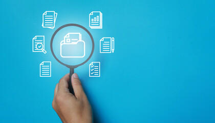 Magnifying glass handle focuses on document files