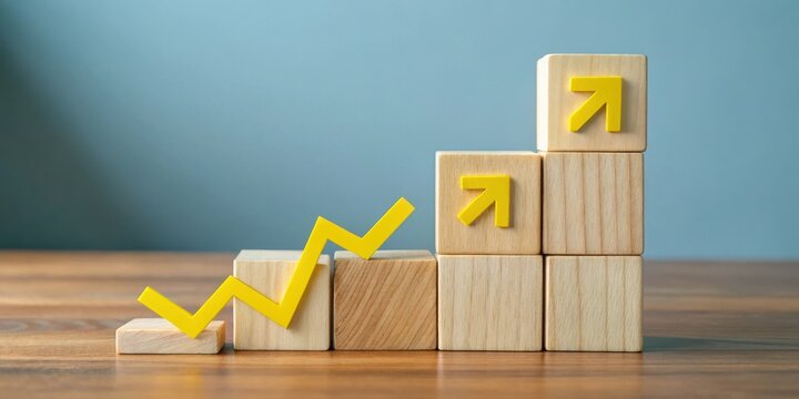 Wooden blocks forming a staircase with upward and downward trending arrows symbolizing growth and setbacks in business planning and strategy.
