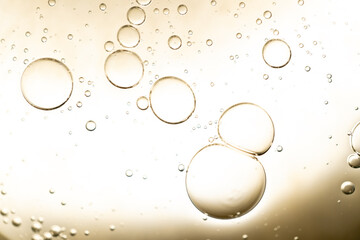 The surface of the cosmetic product has bubbles. blurred background. soft focus