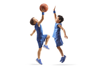 Little boys playing basketball