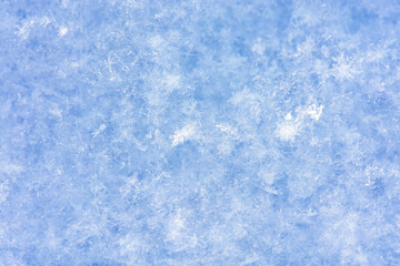 Fototapeta premium Winter white background. Background of fresh snow. Snowfall texture background.