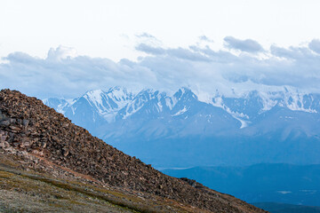  Mountain landscape with snowy peaks in the background