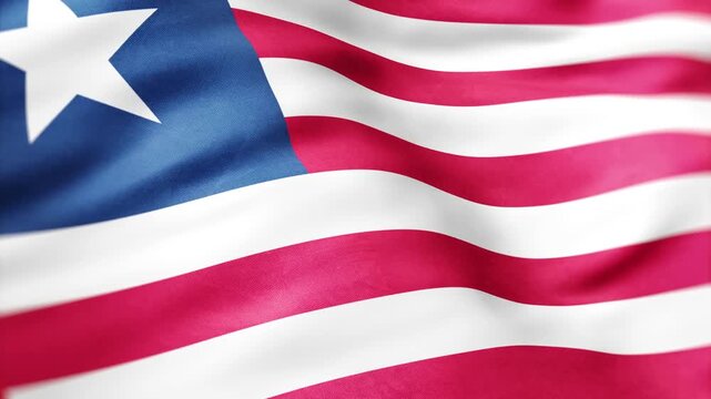 Liberian flag ripples, showing red and white stripes and a single white star on a blue field.