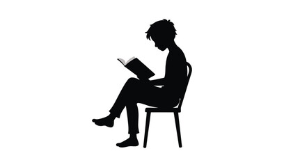 Silhouette of a person sitting on a chair reading a book