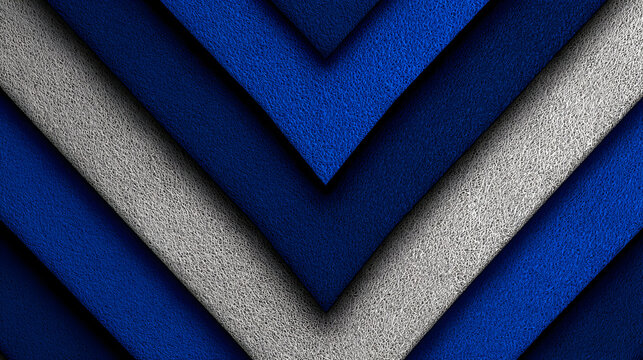 Abstract image of blue and gray fabric arranged in a V-shape pattern.