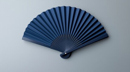 Color hand fan isolated on gray background. Open folding fan for mock-up