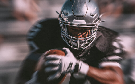 American football male athlete with blur motion effect