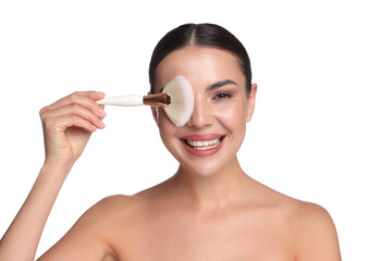Fototapeta premium Beautiful woman with makeup brush on white background