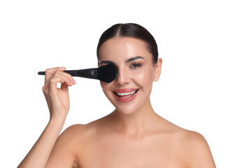 Obraz premium Beautiful woman applying makeup with brush on white background