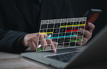 Business executive using laptop with digital calendar interface. Concept of schedule planning, event organization, productivity, and effective time management for corporate work.