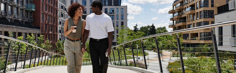 Fototapeta premium Young couple enjoys a summer date in the heart of the vibrant city area