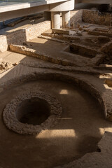 Greek archaeological remains in front of the Acropolis Archaeological Museum in Athens, Greece
