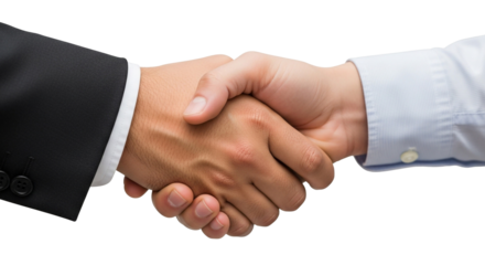 A close up shot of two people shaking hands one wearing a suit and one wearing a light blue shirt