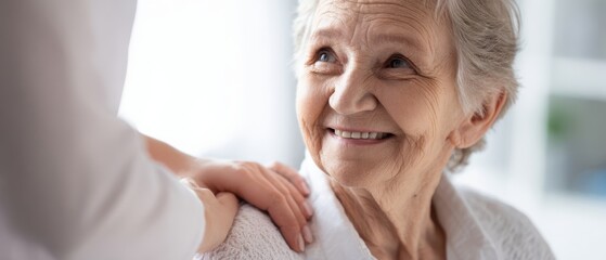 The elderly woman smiling warmly at her caregiver during their heartfelt interaction.