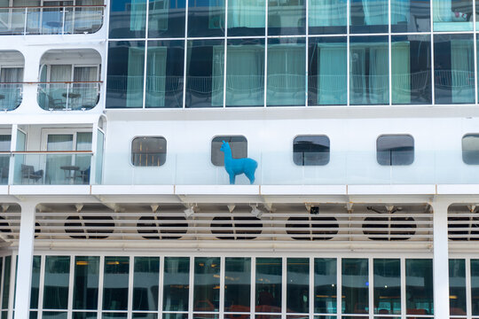 St. John's, Antigua: Alpaca mascot on Marella Discovery Cruise Ship by TUI Cruises and Marella Cruises. Teal life-sized alpaca model, chosen to make guests smile, moves around ship.