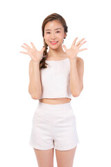 Beautiful smiling young Asian woman with braid hairstyle wearing white sleeveless crop top and shorts standing isolated on a transparent background showing both hands open cheerful friendly expression