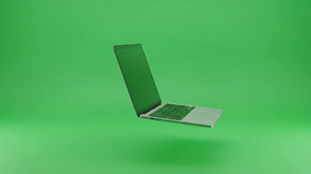 Green Screen People & Lifestyle Modern Silver Laptop Floating in Mid-Air on Green Background  Green Screen  Chroma Key