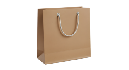 Tan paper shopping bag with rope handles on transparent background