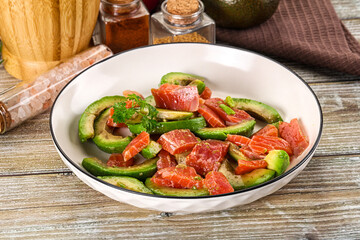 Salad with avocado and salmon