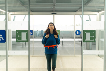 woman entering the airport
