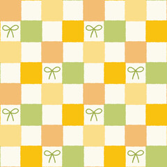 Checkerboard seamless pattern with bows in yellow and green