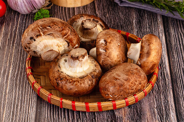 Raw brown champignon heap for cooking