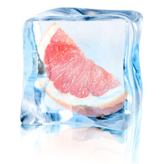 Piece of fresh grapefruit inside ice cube on white background