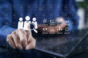 HR Human resources management concept. Recruiting, leadership and team building. HR manager using laptop with HR icons on virtual screen.