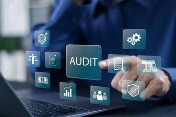 Audit business concept. businessman use laptop with financial examination for business and financial management system. Compliance with internal organization financial services regulation,