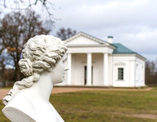 Fototapeta premium Classical bust of a woman, overlooking a white pavilion