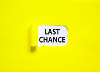 Last chance symbol. Concept word Last chance on beautiful white paper. Beautiful yellow paper background. Business last chance concept. Copy space.