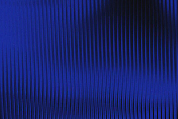 Abstract blue fabric with vertical texture and subtle gradient, creating a modern and elegant background