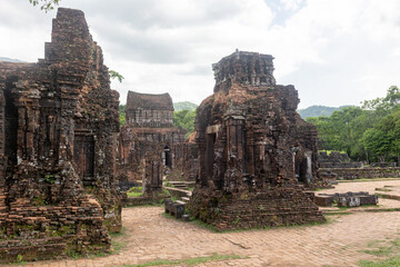 European family, visiting My Son Sanctuary, national heritage sightseeing in Vietnam, tourist...