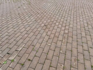 The Textured Paver Brick Pattern is perfect for stunning landscaping and functional driveways. Detailed closeup view of interlocking paver bricks, which are ideal for constructing patios and pathways