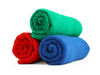 Colorful rolled terry towels isolated on white