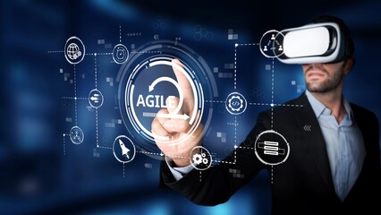 A businessman explores innovative agile technology concepts using virtual reality glasses, interacting with a digital interface in a futuristic workspace. Raster