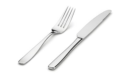 A classic dining set of a silver fork and knife neatly arranged and isolated on a clean white background