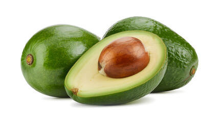 Closeup of two whole avocados and a half isolated on white background