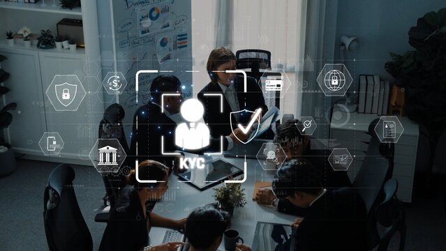 A team conducts a business meeting focused on KYC processes, showcasing the integration of digital technology and collaborative efforts in a modern office setting. Raster