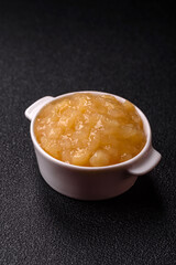 Apple sweet sauce, baby food, canned ingredient for desserts. Apple sauce