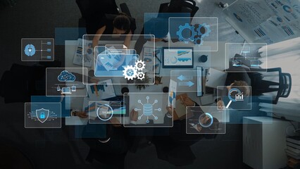 A modern office meeting showcases a diverse team collaborating over digital analytics and data visualizations, fostering innovation and effective project planning. Raster