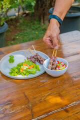Delicious grilled skewers with fresh sides, perfect for a summer barbecue or outdoor dining