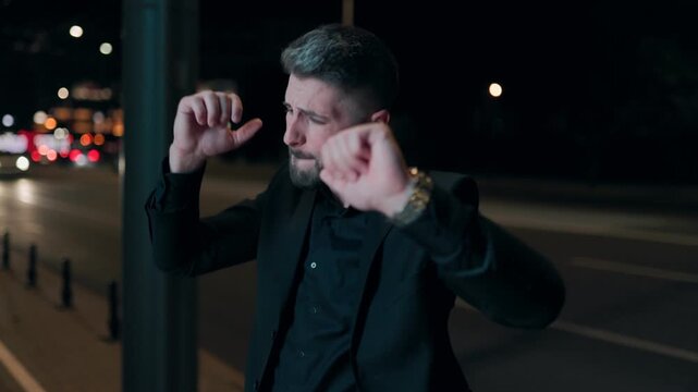 Young Carefree Businessman Dancing Stylishly on Nighttime Street - Powered by Adobe