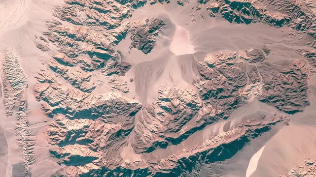 Top shot on sandy mountains with prints of erosion in desert. Camera is moving backward and right. Animation based on image by NASA