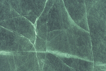 Green water texture with sunlight reflections