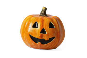 A carved halloween pumpkin with evil eyes and face isolated on white.
