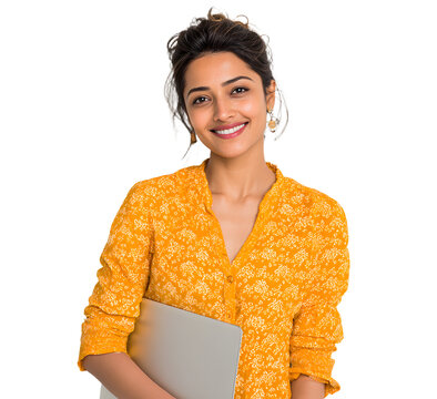 Cheerful young Indian woman holding a laptop in a stdio setting
